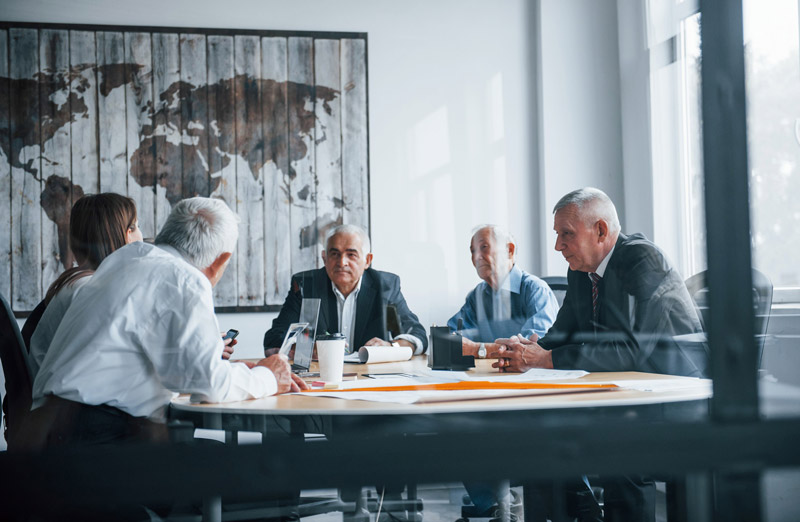 aged team elderly businessman architects have meeting office works with young woman 146671 29182